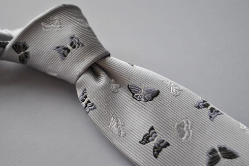 silver grey tie with butterfly embroidered design